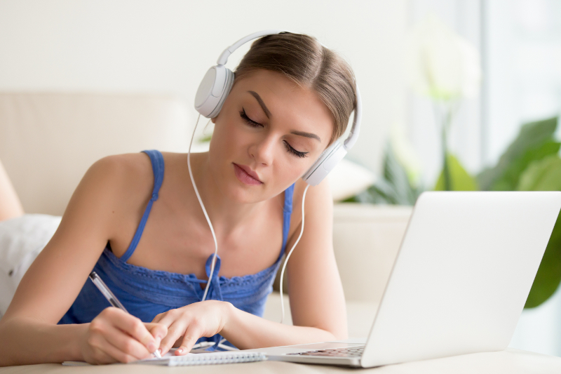 online paramedic program student taking notes